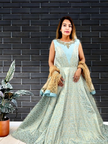Party Wear Grey And Blue Broach Work Brocade Silk Gown
